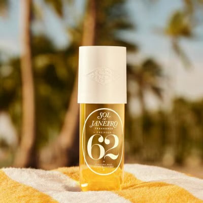Sol de Janeiro Cheirosa 62 Mist lifestyle shot with palm trees