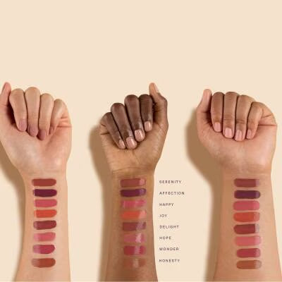 Rare Beauty Soft Pinch Tinted Lip Oil - shade Hope on two skin tones